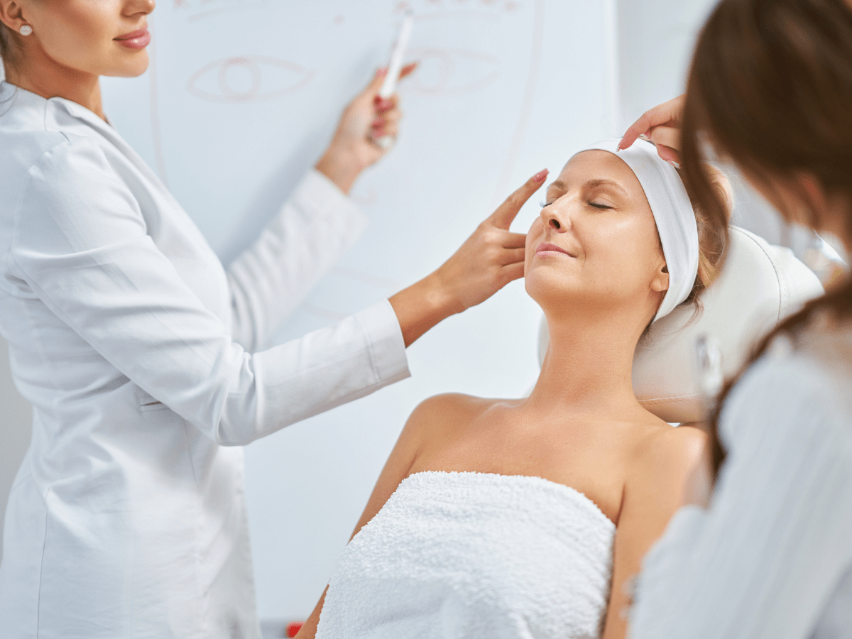 A Valmére Skin Science trainer educating a licensed aesthetician on the best skincare practices.